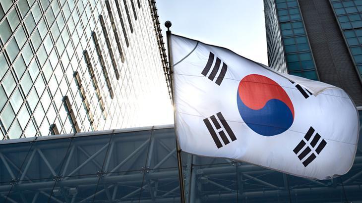 Güney Kore büyüme tahminini düşürdü